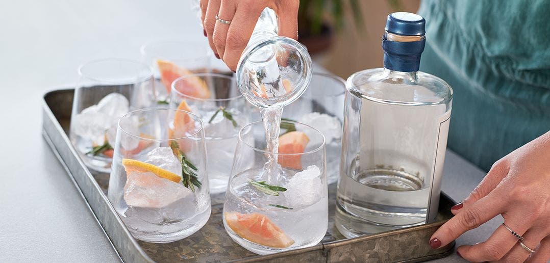 Mocktails being poured onto a tray