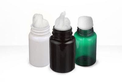 3 packer bottles showing pharmaceutical coil or ball at the top. Left to right: White Bottle, Dark Amber Bottle, Green Bottle