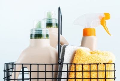 Different types of Cleaning Products in Bottles in a basket
