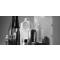 Black and white photo of various types of bottles including plastic, glass, and aluminum.
