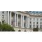 Government building with American flag and columns